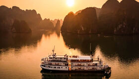 Awaken to Halong Bay’s golden glow aboard Emeraude